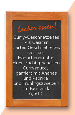 Mittagstisch:Curry-Geschnetzeltes "Riz Casimir" Zartes Geschnetzeltes von der Hähnchenbrust in einer fruchtig-scharfen Currysauce, garniert mit Ananas und Paprika und Frühlingszwiebeln im Reisrand.