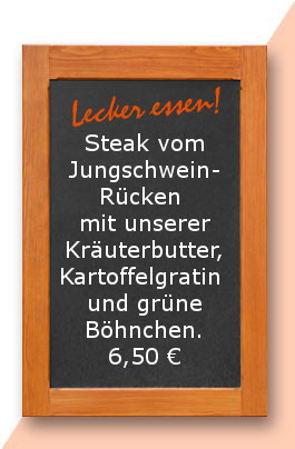 Steak vom Jungschweinrücken mit unserer Kräuterbutter, Kartoffelgratin und grüne Böhnchen.