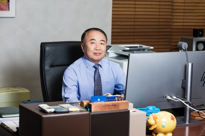 写真：APSの鄭基魯会長