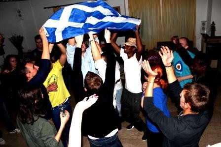 Participants trying to dance Sirtaki dance after the presentation about Greece