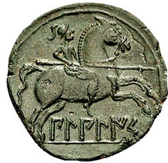 Bronzene iberische Münze mit Reiterkrieger und iberischer Schrift (um 100 v. Chr.). Text lesbar, aber unübersetzbar: bilbiliz. Quelle: Monéda Iberica