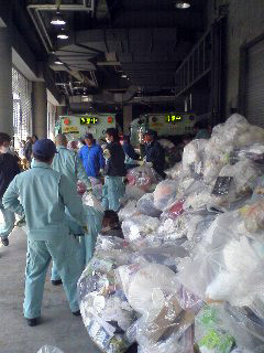 Mountain of garbage, horde of garbage men