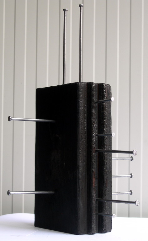 "Chiodo scaccia chiodo #03" 1/1 scultura, 2009 -legno combusto/chiodi- cm36 x 52h x 32