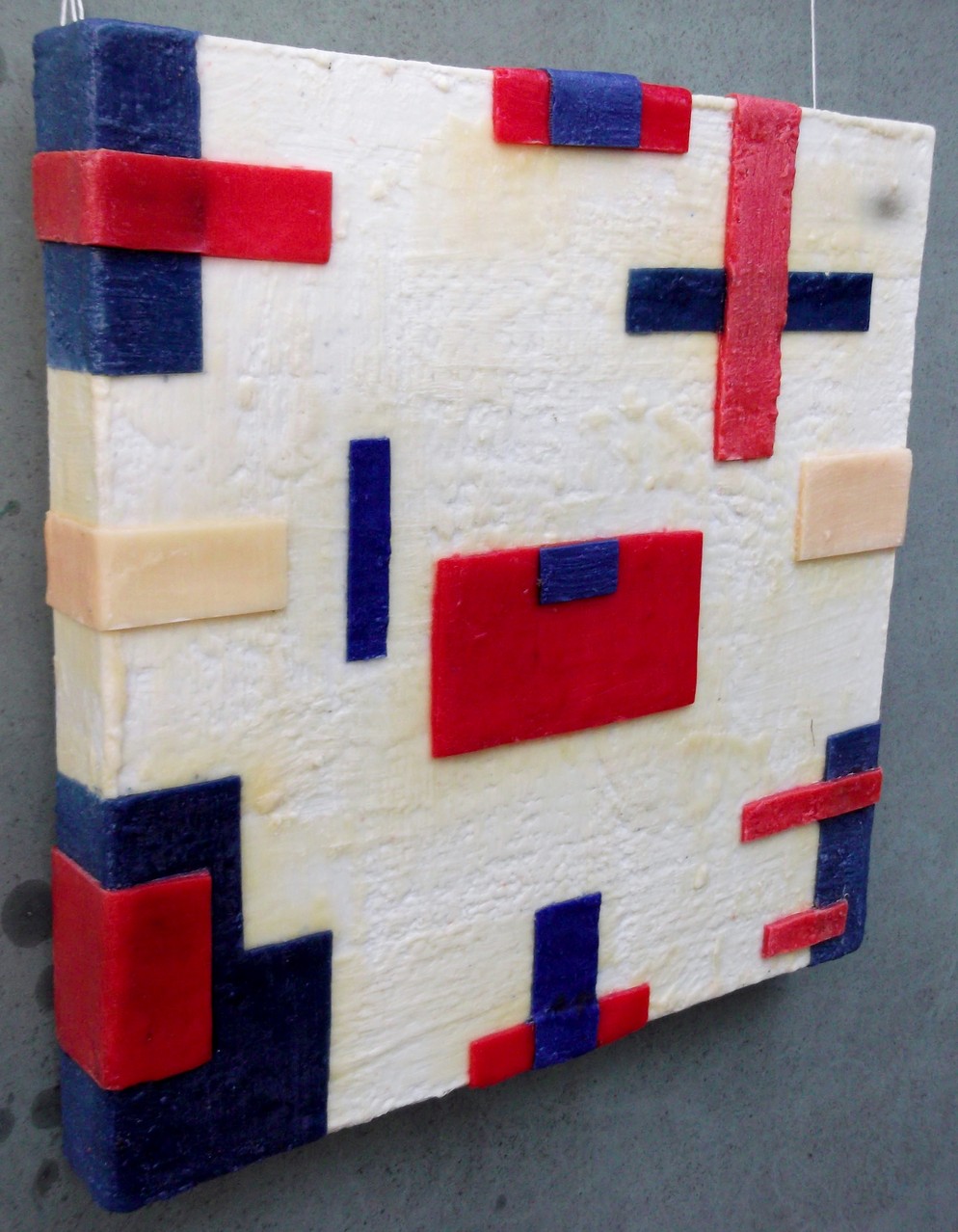 -Urban relief # 06 - 2014 - scented wax stratification on canvas - ( left side) cm  40 x 40 x 5