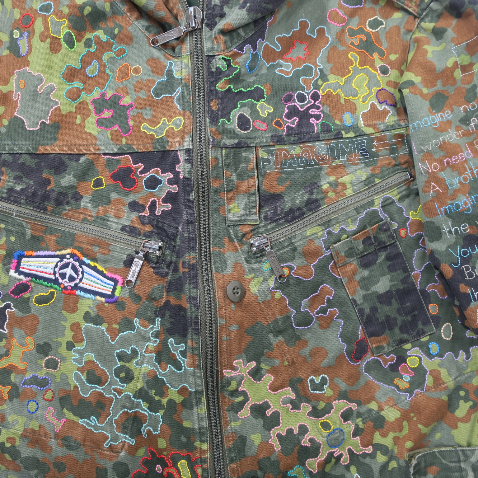 imagine johnlennon statementparka kamouflage camo camouflage slowfashion fairfashion crueltryfree loveandpeace kaufmuseum embroidery handgestickt stickereifriedensbewegung peacemovement