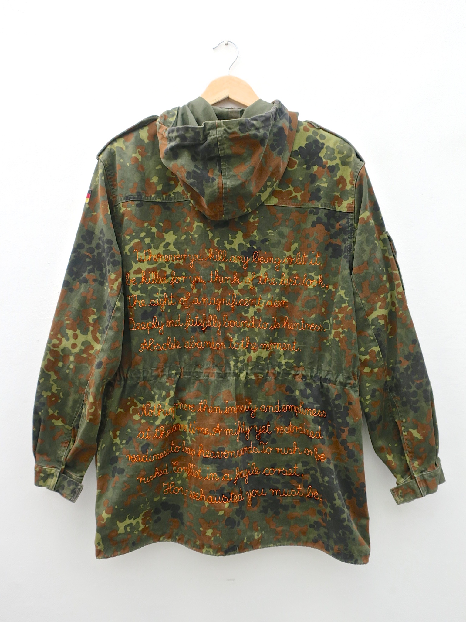 camouflage camo statementfashion vegan hunting deer ethicalfashion fair fashion upcycle animallover parka embroidery handbestickt stickerei