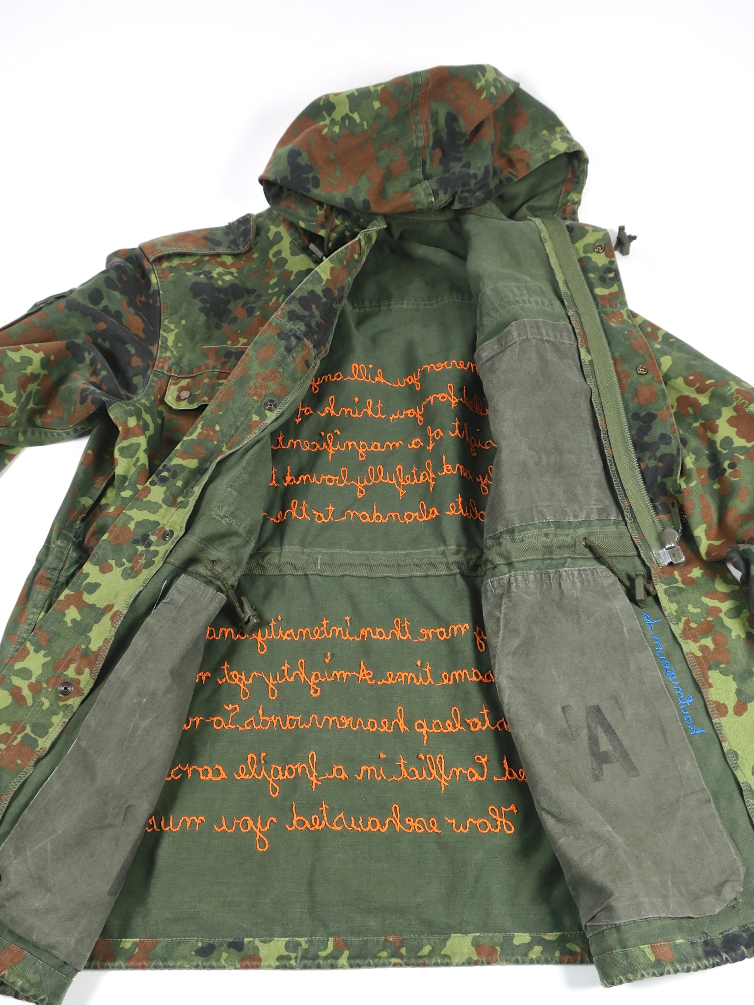 camouflage camo statementfashion vegan hunting deer ethicalfashion fair fashion upcycle animallover parka embroidery handbestickt stickerei