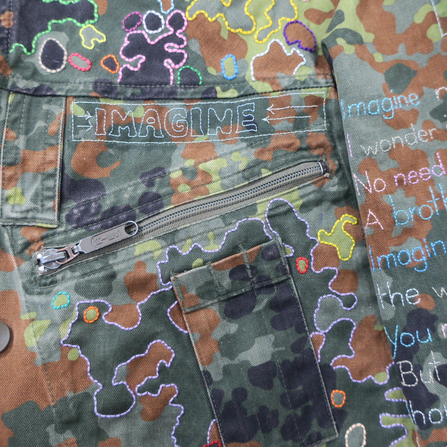 imagine johnlennon statementparka kamouflage camo camouflage slowfashion fairfashion crueltryfree loveandpeace kaufmuseum embroidery handgestickt stickereifriedensbewegung peacemovement