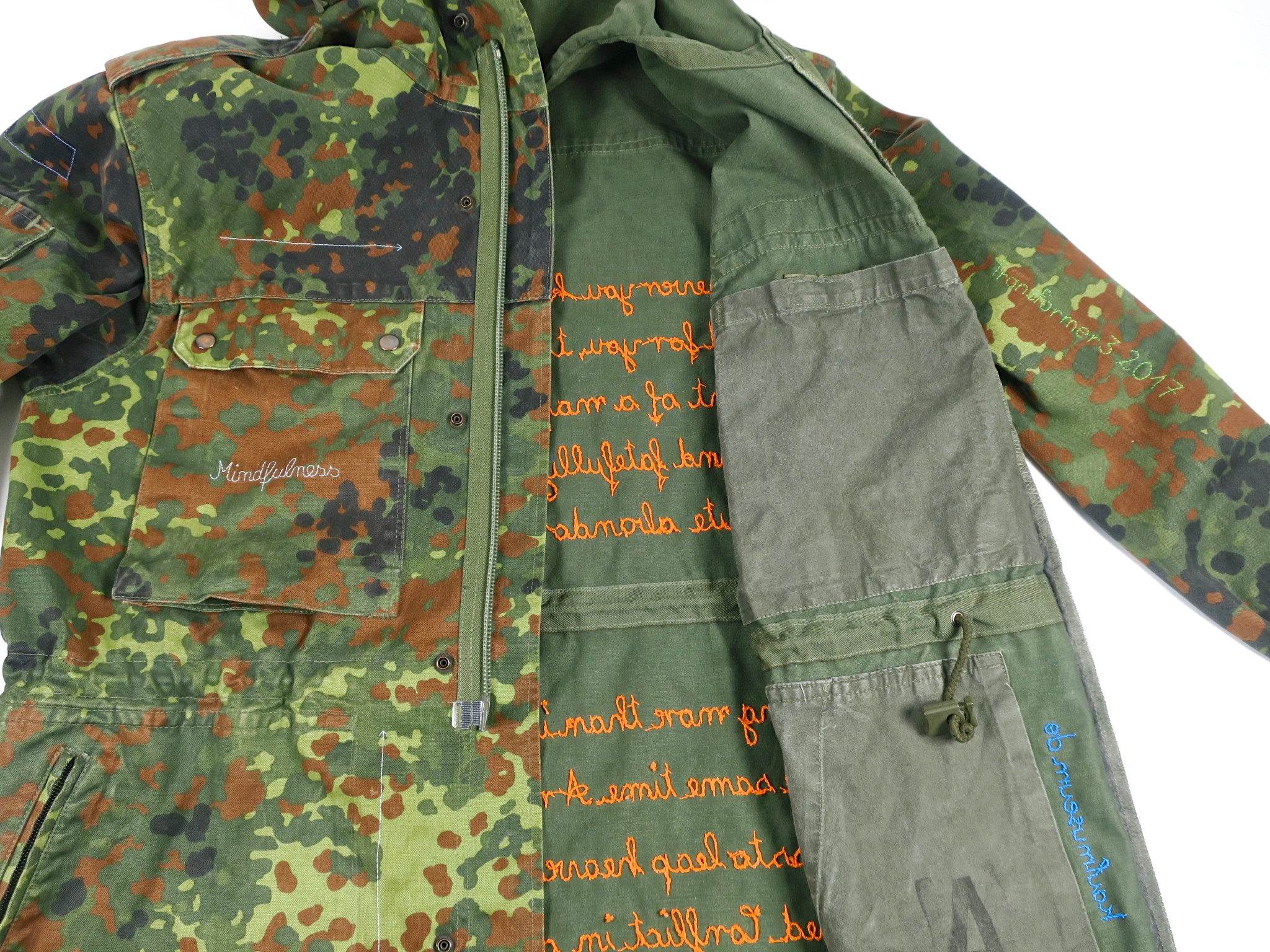 camouflage camo statementfashion vegan hunting deer ethicalfashion fair fashion upcycle animallover parka embroidery handbestickt stickerei