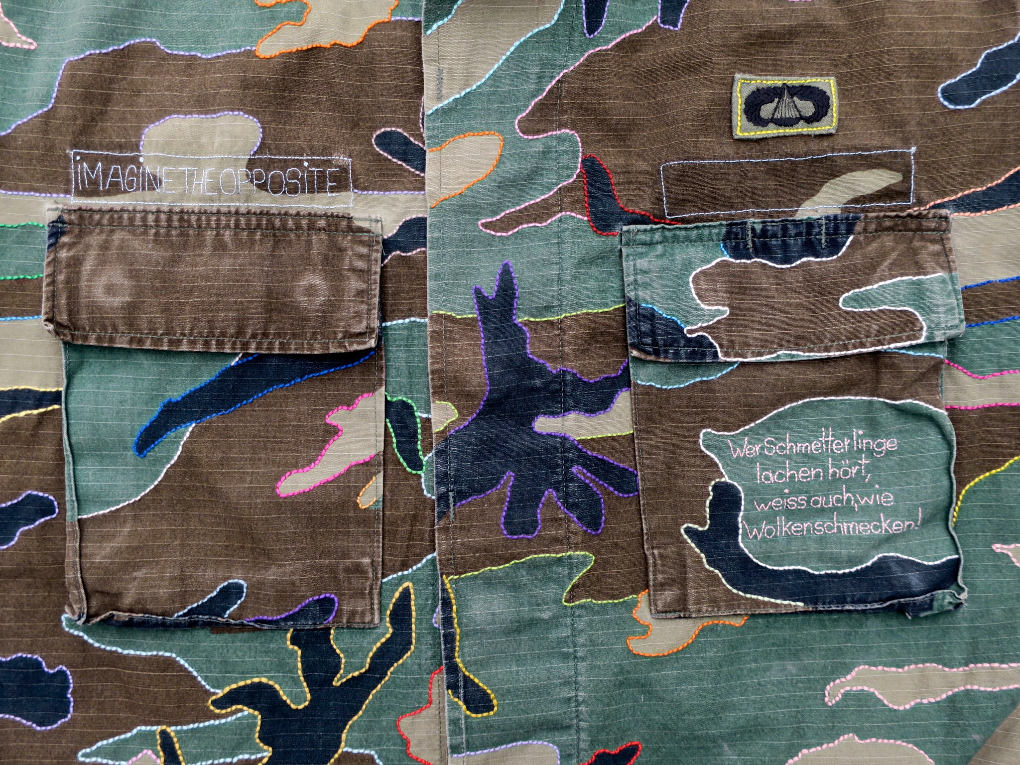 camouflage camp military combat uniform parka hippie boho peacemovement love&peace imagine the opposite slow fashion fluorescent crueltyfreefashion ökofashion eco hand embroidery handgestickt statement ethical kaufmuseum