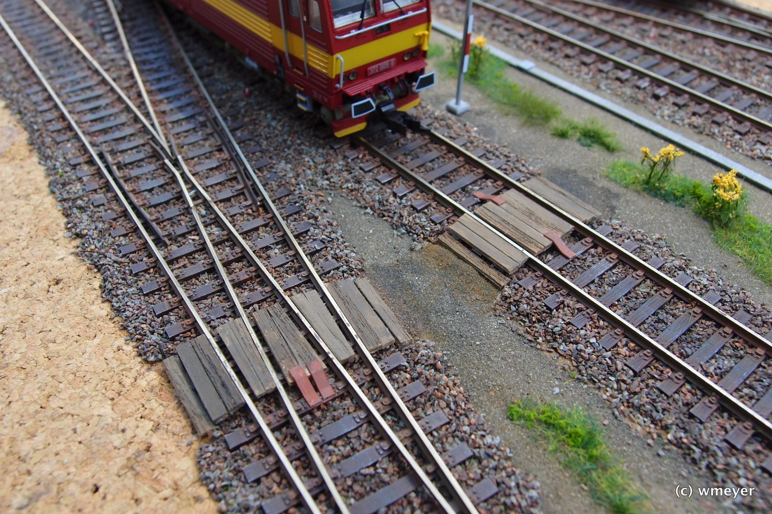 Zusätzliche Details: Bohlenübergang mit Kupplungsfänger