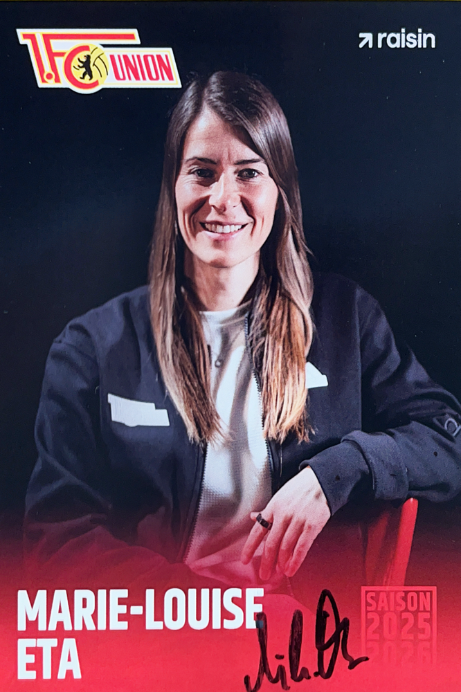 Marie-Louise Eta, Union Berlin, first female headcoach in the Bundesliga, coached 5 games at the end of the season 25/26, now headcoach women’s team Union München, as player: 3xGerman Champion, U20 World Champion, Champions League Winner, Autograph by Mail