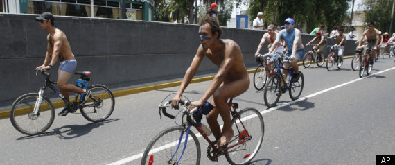 Hundreds of naked and semi-nude bicyclists rode through Lima, Peru to demand safer road conditions.