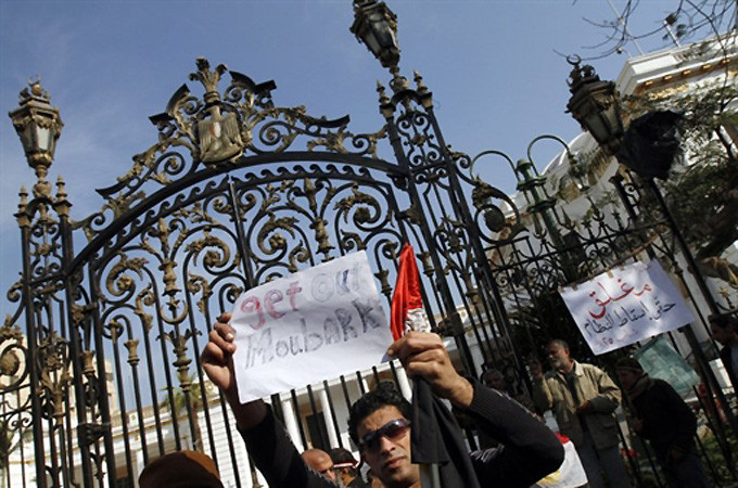 Pro-democracy protesters have gathered outside the parliament, near Cairo's Tahrir Square [AFP]
