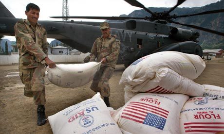 World Food Programme wheat is unloaded from a US navy helicopter in Pakistan. Photograph: Paula Bronstein/Getty Images