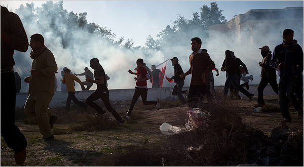 Protesters in Diraz, a village in Bahrain, were attacked Monday by the police, who fired tear gas and rubber bullets at them. By MICHAEL SLACKMAN and ALAN COWELL Published: February 15, 2011