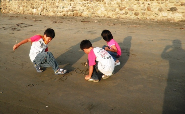 Children Playing with the Sand