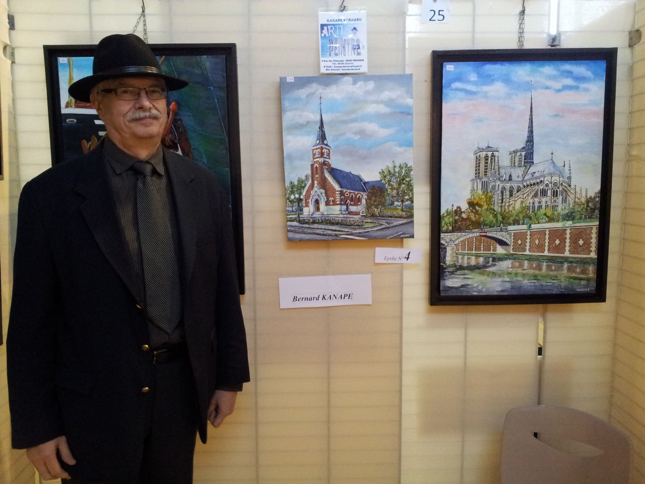 Monsieur Kanape devant la belle église d'Epehy qu'il a réalisée
