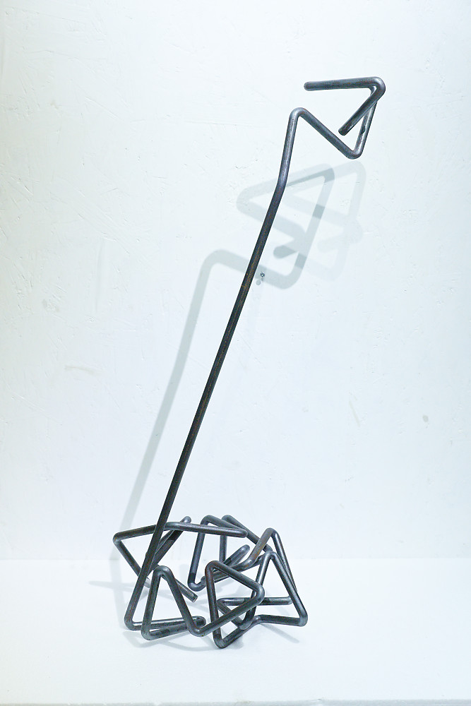 Sculpture en acier réalisée par cintrage