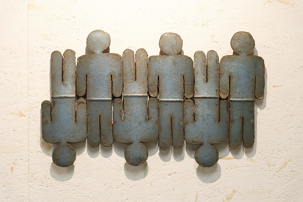 Tableau en acier représentant des personnages bleus