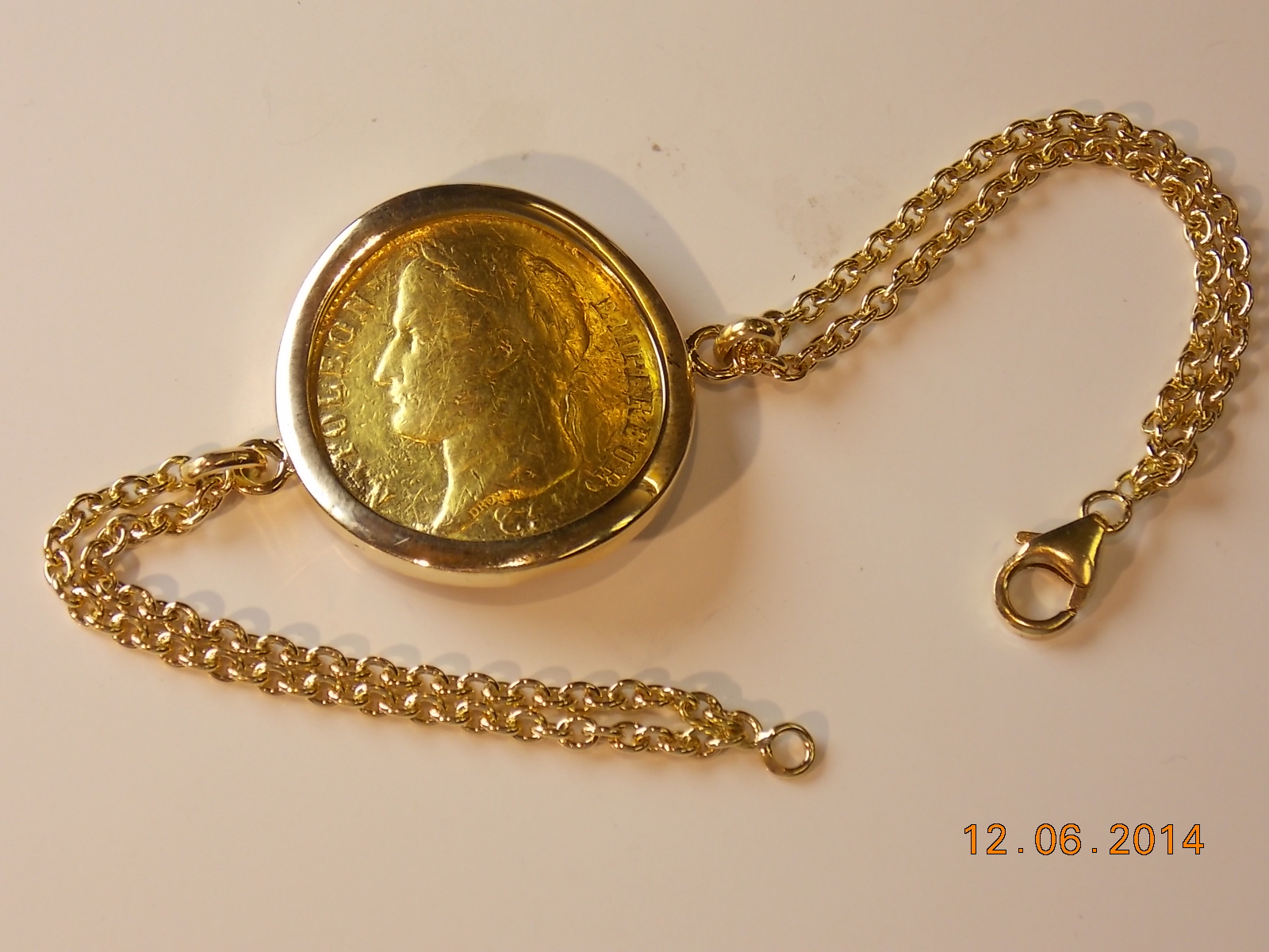 Bracelet double chaîne, pièce Or jaune serti pièce 20 francs