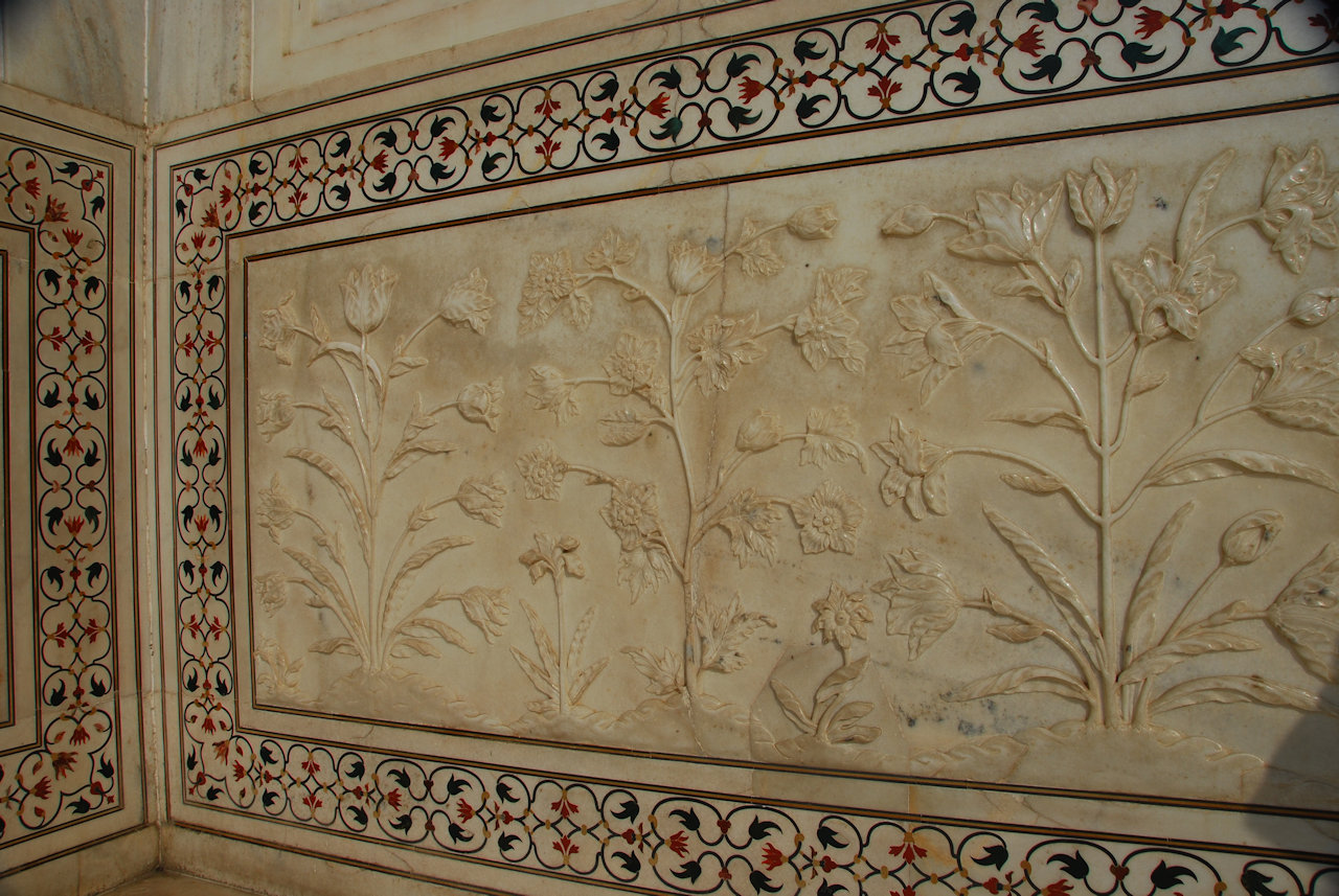Agra 26.11.2014: Marble relief work and Pietra Dura outside the Taj Mahal.