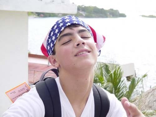 13 year old Joseph + patriotism in Mexico, no chicken this time.