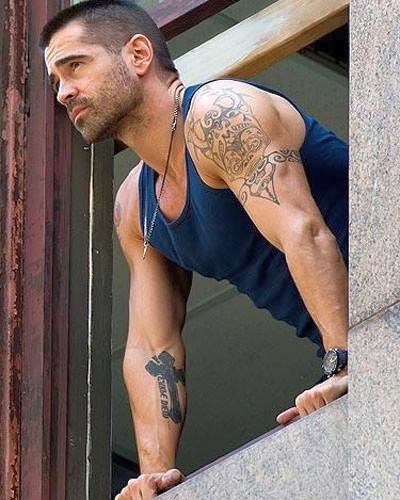 Another man who wears his ink well...Colin Farrell.