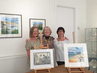    Hannah Hoad, Jenny Morten and Judy Burnett at the opening of the exhibition