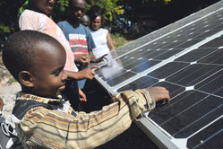 Children of the SOS Children's Village experience SOLARA solar modules