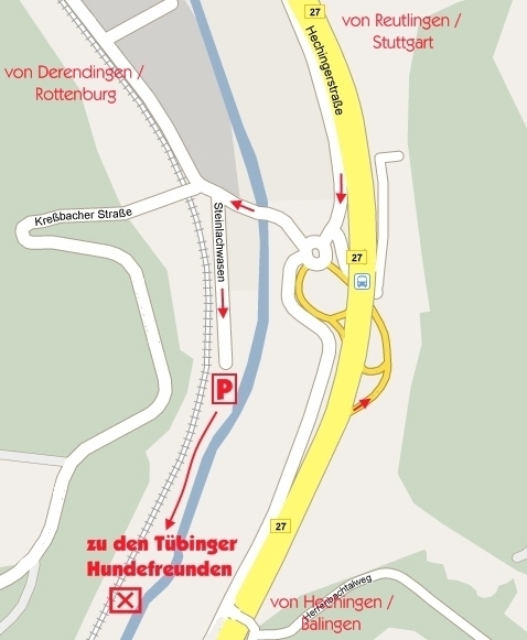 Kartenausschnitt mit Straßen, einem Parkplatz, einem Kreisverkehr und Pfeilen zur Verkehrsführung, Beschriftungen mit Ortsangaben und Ziel 'zu den Tübinger Hundefreunden'.