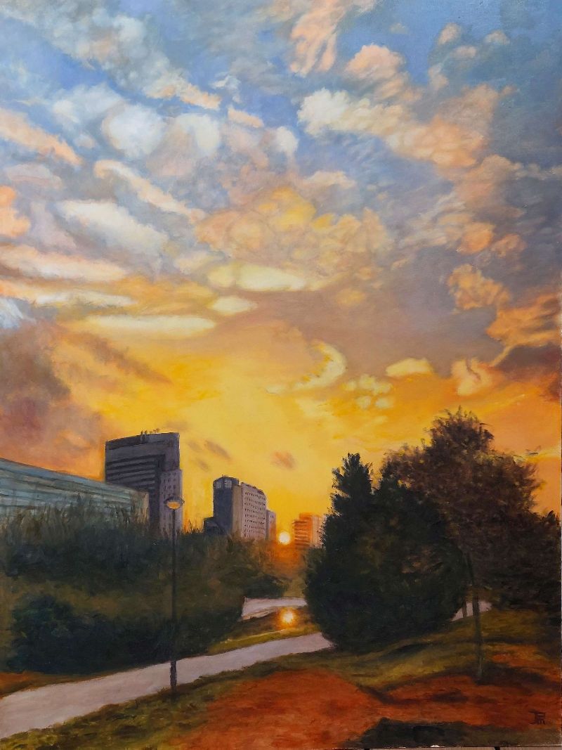 Óleo realista “Amanecer en el Jardín del Turia” con sol naciente entre edificios y arboleda – Joaquín Pardo