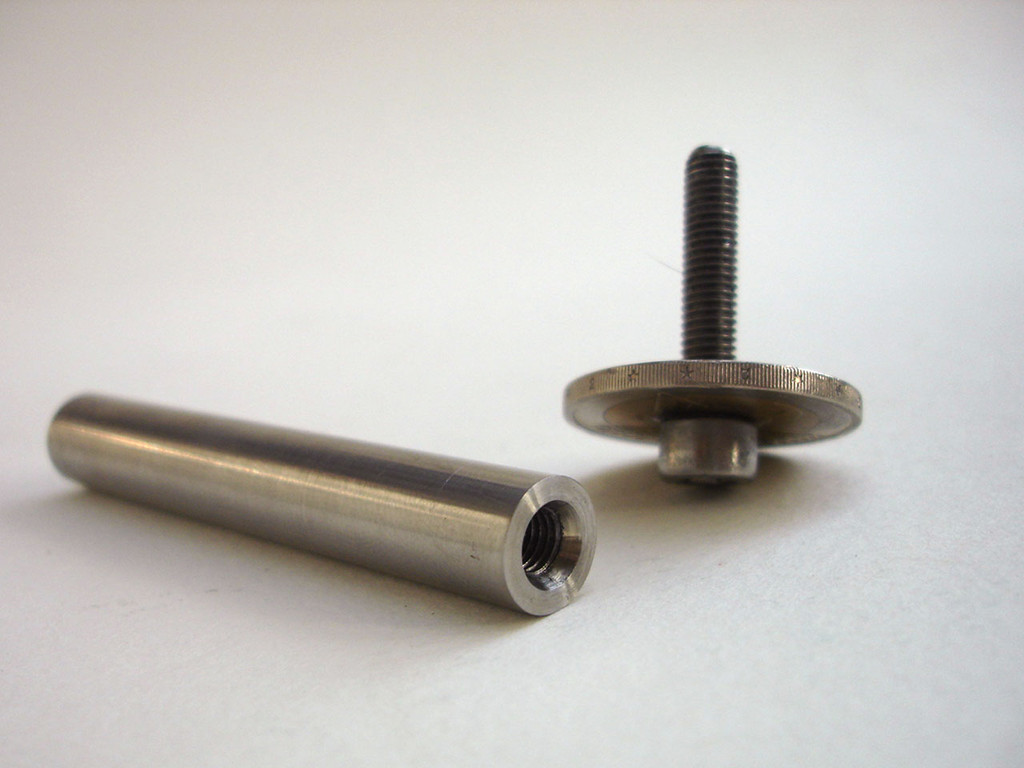 Make drive screw by centre drilling and tapping knurled coin and inserting M5 x25mm A2 stainless cap set screw.