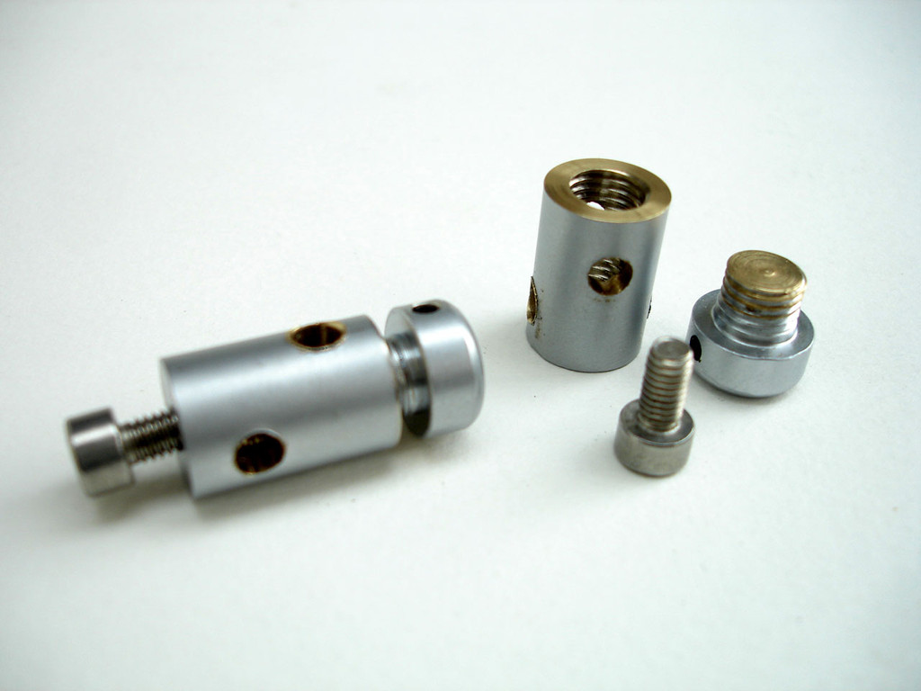 Arm / needle shaft connector - WM 12 standoff fitting. See parts list for supplier.