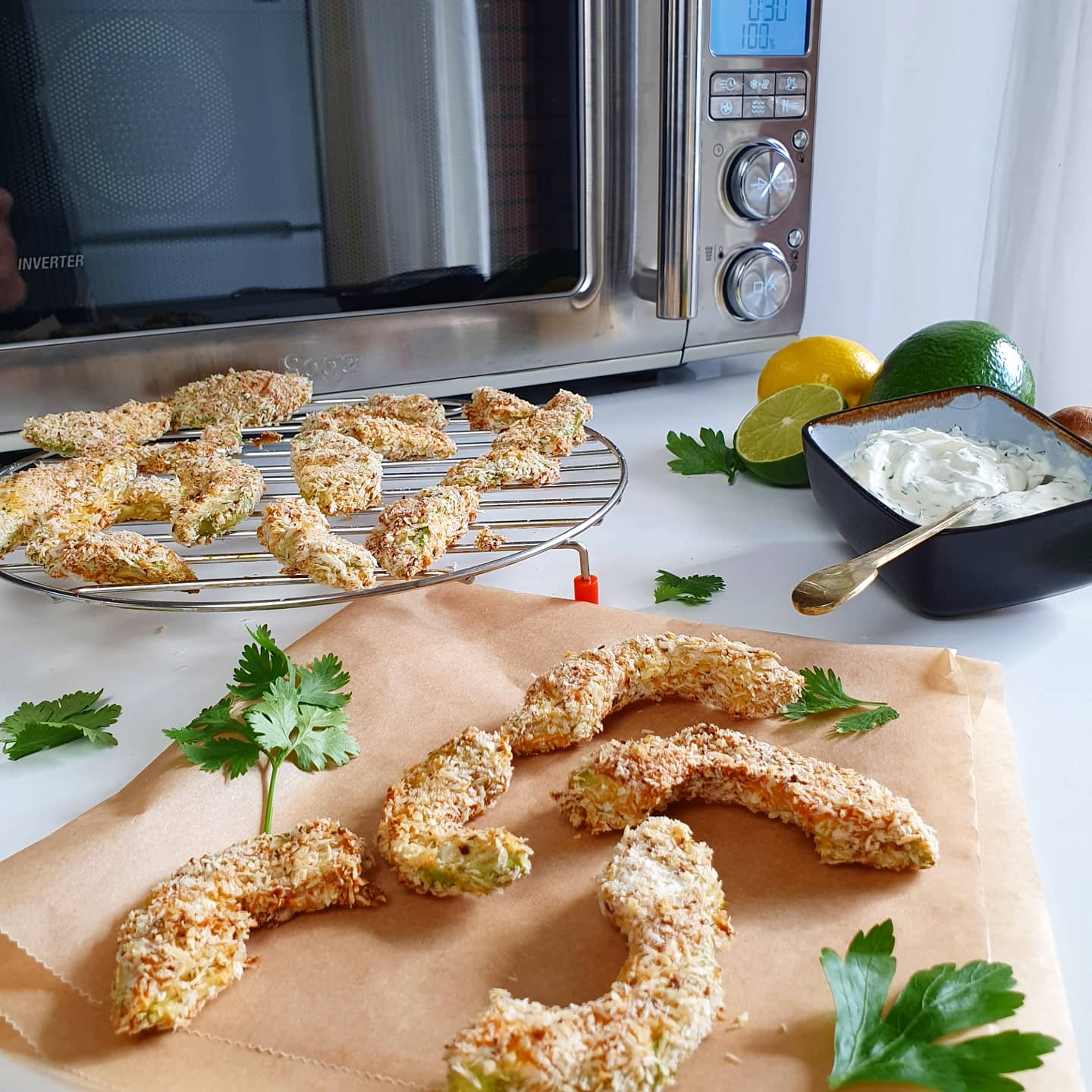 Crunchy Avocado bites with ranch sauce.