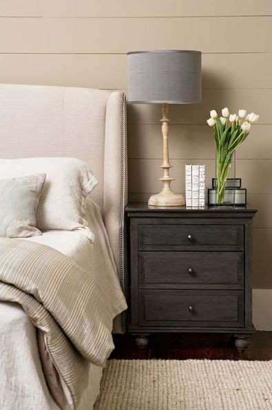 This greige coloured room looks beautifully staged with fresh tulips and a neutral colour scheme.