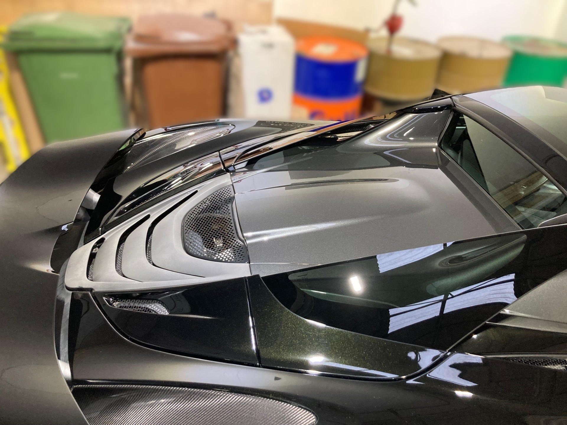 Mclaren 720s Spider engine cover has been colour-match Before - Precision Paint Wellington