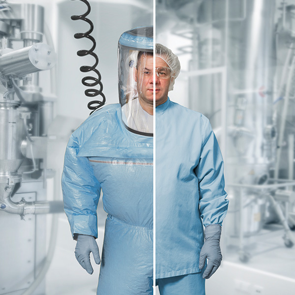 Photo of Pharma Worker with different Containment suits