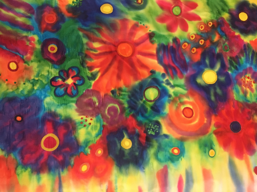 Colorful flowers represent joy on a silk flag