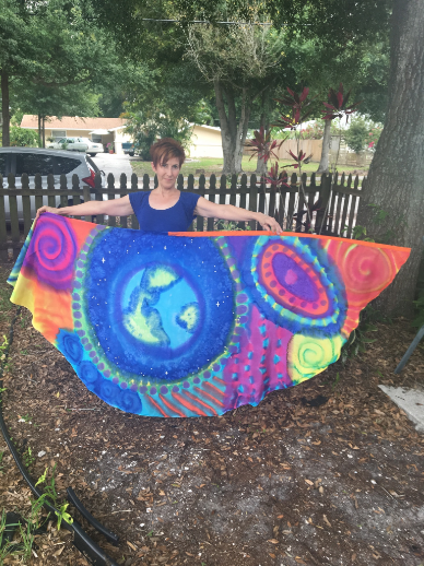 Wing shaped silk flag with Earth, Galaxies and  Stars