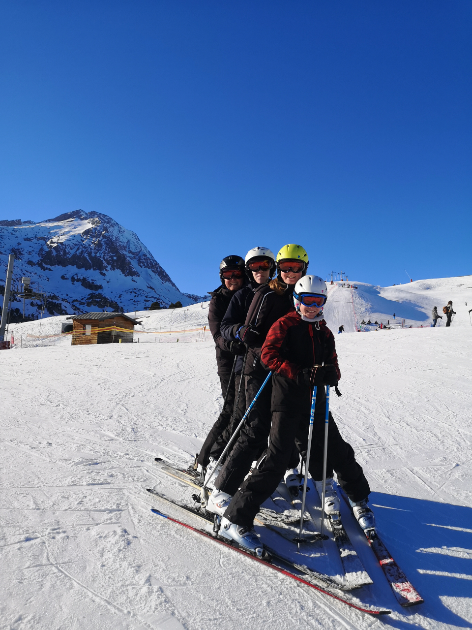 Cours de ski collectif adultes, en famille