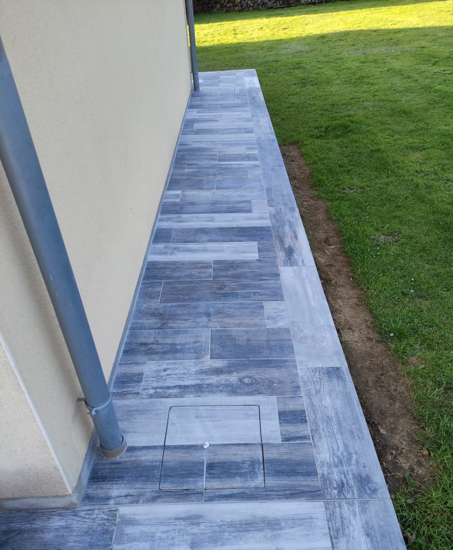 création de trottoirs autour de la maison - Grainville-la-teinturière