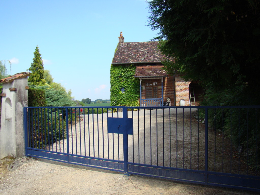 Une maison qui domine la Saône