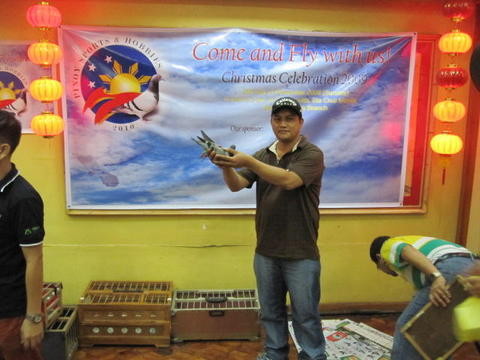 Me holding a raffe bird from Mr. David Chan PHA-09-213741 Carteus Line
