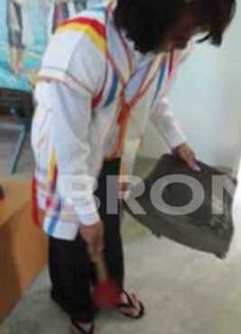 Fig. 13. Drummer with Khayah costume playing down/up as for funerals