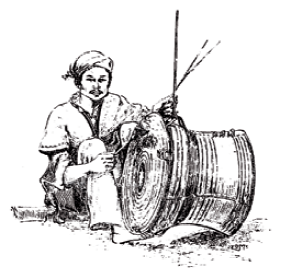 Playing a bronze drum player in Burma
