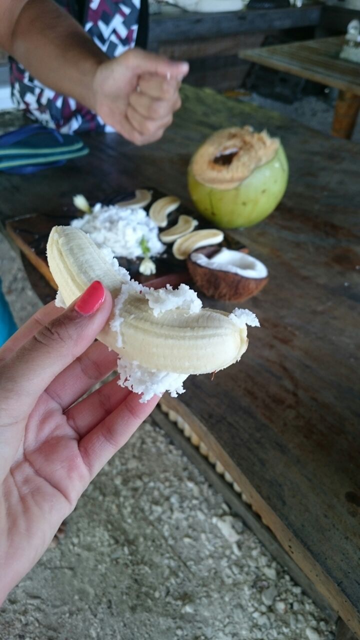 Our guide said "This is Tahitian Hot Dog!" On the island grown banana and super fresh coconut 