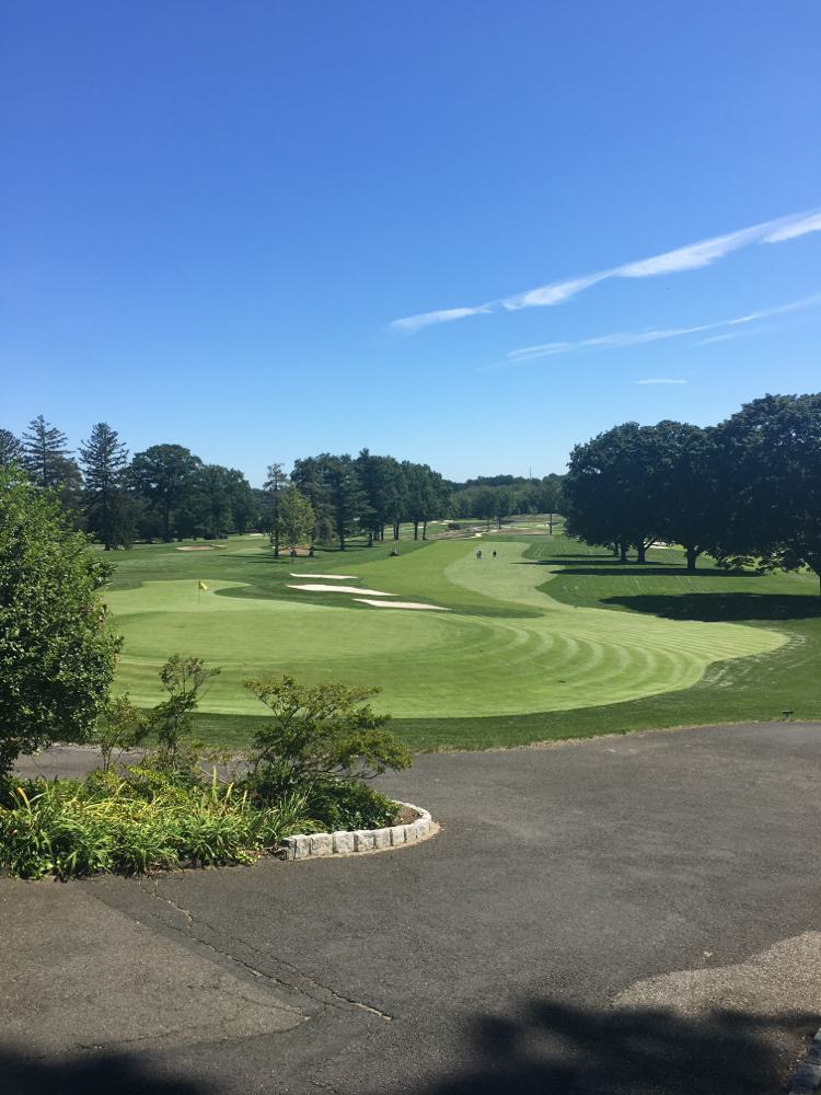 A view of the 9th green and fairway, looking back
