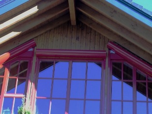 Blockhausbau - Rundbohlenhaus - Rollladenkästen - Sommer 