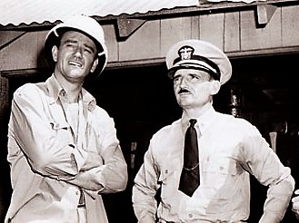 John Wayne's first trip to the Marine base at Pendleton: pictured with Admiral Lewis B. Combs, technical advisor of "The Fighting Seabees". 